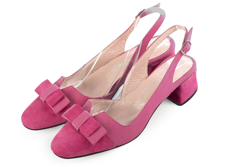Fuschia pink women's open back shoes, with a knot. Round toe. Low flare heels. Front view - Florence KOOIJMAN